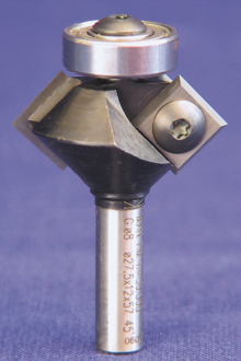 Bearing guided chamfer cutter with interchangeable tips